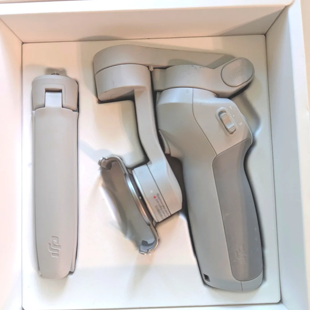 DJI OM 4 Smartphone Gimbal Stabilizer with Case & Manuals